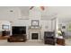 Living room with fireplace, complemented by neutral walls, and plush carpeting at 1889 Raegan Way, Lawrenceville, GA 30043