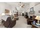 Bright and airy living room with fireplace, neutral walls, and plush carpeting at 1889 Raegan Way, Lawrenceville, GA 30043