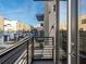 Balcony view of the street and neighboring townhomes, showcasing outdoor living space and neighborhood at 415 Gartrell Se St # 16, Atlanta, GA 30312