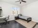 Cozy bedroom with hardwood floors, a large window, and a desk for work at 415 Gartrell Se St # 16, Atlanta, GA 30312