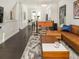 Spacious living area with leather sectional, open floor plan, and foosball table at 415 Gartrell Se St # 16, Atlanta, GA 30312