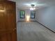 Spacious bedroom features neutral carpet, ceiling fan and two windows at 5741 Wolf Laurel Ln, Lilburn, GA 30047