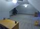 Bonus room with carpet flooring, a ceiling fan, and a desk at 5741 Wolf Laurel Ln, Lilburn, GA 30047