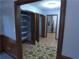 Hallway with tile flooring and storage shelves at 5741 Wolf Laurel Ln, Lilburn, GA 30047