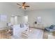 Bright living room with vaulted ceiling, ceiling fan, and stylish decor at 7074 Babbling Brook Dr, Jonesboro, GA 30236