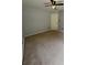 Bedroom with tan carpet, ceiling fan and closet at 955 Tributary Way, Dacula, GA 30019