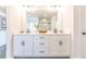 Bathroom featuring double vanity, modern cabinets, and stylish fixtures; clean lines create a luxurious space at 1795 Fulmont Cir, Mableton, GA 30126