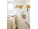 Well-lit bedroom offers a peaceful ambiance, enhanced by chic decor and plush carpeting at 1795 Fulmont Cir, Mableton, GA 30126