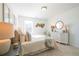 Bright and airy bedroom with neutral tones and stylish decor for a cozy and serene retreat at 1795 Fulmont Cir, Mableton, GA 30126