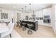 Contemporary kitchen featuring white cabinets, quartz countertops, and a large center island with seating at 1795 Fulmont Cir, Mableton, GA 30126