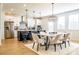 Open-concept kitchen featuring stainless steel appliances, large island, and adjacent dining area at 1795 Fulmont Cir, Mableton, GA 30126
