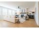 Inviting living room featuring a fireplace, hardwood floors, and modern furnishings, creating a cozy atmosphere at 1795 Fulmont Cir, Mableton, GA 30126