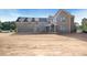Spacious brick home with a three-car garage, dormers and covered front entry at 2395 Kilgore Road (Lot 7) Rd, Buford, GA 30519