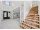 Foyer area showcasing stairs, and a black double door entrance for an elegant arrival at 2395 Kilgore Road (Lot 7) Rd, Buford, GA 30519