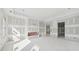 Spacious living room with large windows, fireplace and doorway leading to other room at 2395 Kilgore Road (Lot 7) Rd, Buford, GA 30519