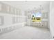 A pre drywall bedroom with large window lets in natural light and overlooks the outdoors at 2395 Kilgore Road (Lot 7) Rd, Buford, GA 30519