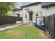 Charming townhouse with a cozy fenced backyard featuring a porch swing and green space at 290 Lakemoore Ne Dr # C, Atlanta, GA 30342