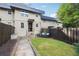 Charming townhouse with a cozy fenced backyard featuring a porch swing and green space at 290 Lakemoore Ne Dr # C, Atlanta, GA 30342