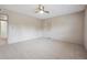 Bedroom featuring neutral carpet and a glimpse into the attached bathroom at 290 Lakemoore Ne Dr # C, Atlanta, GA 30342