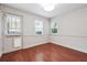 Dining room with hardwood floors, natural light, and access to the outside at 290 Lakemoore Ne Dr # C, Atlanta, GA 30342