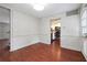 Dining room featuring hardwood floors with a view of the modern kitchen at 290 Lakemoore Ne Dr # C, Atlanta, GA 30342