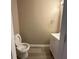 Powder room featuring modern toilet, a vanity with sink, and vinyl floors at 5538 Pineridge Ct, Forest Park, GA 30297