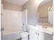 This bathroom features a tub, toilet, vanity, and modern fixtures at 5538 Pineridge Ct, Forest Park, GA 30297