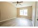 Bright bedroom features vaulted ceiling, hardwood floors, and an abundance of natural light at 5538 Pineridge Ct, Forest Park, GA 30297