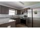 Beautiful kitchen with granite countertops, stainless steel appliances and stylish cabinets at 5538 Pineridge Ct, Forest Park, GA 30297