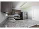 Updated kitchen features granite counters and stainless appliances at 5538 Pineridge Ct, Forest Park, GA 30297