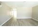 Bright living room with luxury vinyl plank flooring throughout at 5538 Pineridge Ct, Forest Park, GA 30297