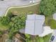 An aerial view shows the home's roof, landscaping, patio, and neighborhood at 2350 Rosebrook Se Xing, Atlanta, GA 30339