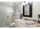 Bathroom featuring a glass shower, white tile, granite counters, and a black mirror at 2350 Rosebrook Se Xing, Atlanta, GA 30339