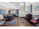 Elegant dining room with hardwood floors, high ceilings, and a chandelier, perfect for entertaining guests at 2350 Rosebrook Se Xing, Atlanta, GA 30339