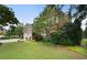 Charming two-story brick home with a well-maintained lawn and landscaped front yard at 2350 Rosebrook Se Xing, Atlanta, GA 30339