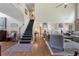 Spacious foyer features staircase and view of living areas at 2350 Rosebrook Se Xing, Atlanta, GA 30339