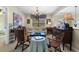 Sitting room area featuring a patterned chandelier, neutral walls, and two arm chairs at 2350 Rosebrook Se Xing, Atlanta, GA 30339