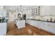 Modern kitchen with white cabinets, granite countertops, and stainless steel appliances at 2350 Rosebrook Se Xing, Atlanta, GA 30339