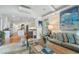 Open-concept space seamlessly connecting the kitchen and sunroom at 2350 Rosebrook Se Xing, Atlanta, GA 30339