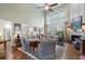 Bright living room with high ceilings, a fireplace, and comfortable seating, perfect for relaxation at 2350 Rosebrook Se Xing, Atlanta, GA 30339