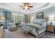 Serene main bedroom boasts tray ceilings, soft colors, and natural light at 2350 Rosebrook Se Xing, Atlanta, GA 30339
