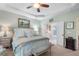 Comfortable main bedroom includes a sitting area and access to the main bathroom at 2350 Rosebrook Se Xing, Atlanta, GA 30339