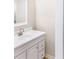 Clean half bathroom with white vanity, modern faucet, and neutral wall paint at 468 Watson Ferry Dr, Forest Park, GA 30297