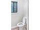 Cozy half bath features a classic toilet and neutral wall paint at 468 Watson Ferry Dr, Forest Park, GA 30297
