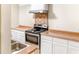 Galley kitchen featuring an oven, laminate countertops and stainless steel sink at 468 Watson Ferry Dr, Forest Park, GA 30297