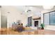 Bright living room with vaulted ceilings, stone fireplace and sliding glass doors to the outside at 468 Watson Ferry Dr, Forest Park, GA 30297