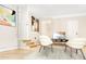 Living room with a small step-up, natural lighting, and neutral-colored walls, creating a welcoming space at 468 Watson Ferry Dr, Forest Park, GA 30297