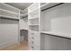 Spacious walk-in closet with custom shelving and drawers offering ample storage at 6178 Lake Lanier Height Rd, Buford, GA 30518