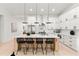 Gourmet kitchen with a large island, modern appliances, and sleek cabinetry at 6178 Lake Lanier Height Rd, Buford, GA 30518