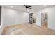 Bright bedroom featuring a walk-in closet with custom shelving, and natural light at 6178 Lake Lanier Height Rd, Buford, GA 30518